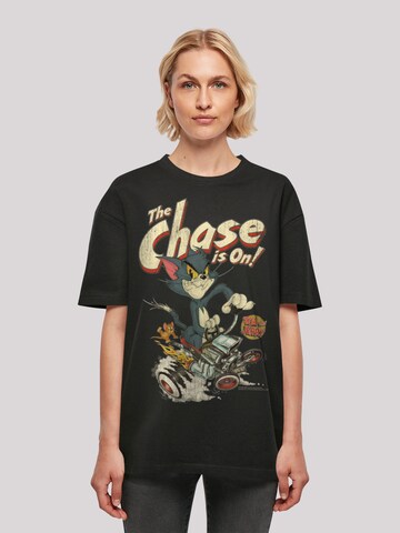 F4NT4STIC Oversized shirt 'Tom und Jerry The Chase Is On' in Zwart: voorkant