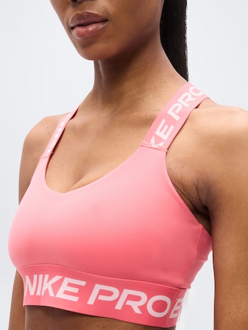 NIKE Бюстье Спортивный бюстгальтер в Оранжевый