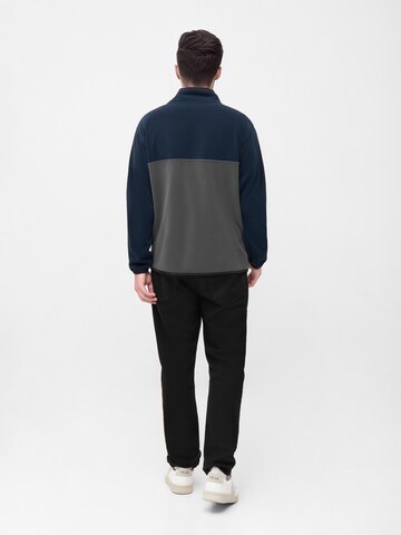 Sweat-shirt 'TreeFleece Quarter Zip Colorblock' NIKIN en bleu