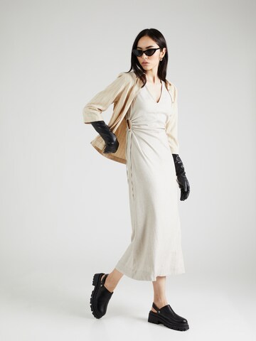 Rochie 'OBJLIVA' de la OBJECT pe bej