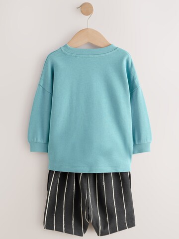 Set Next en bleu