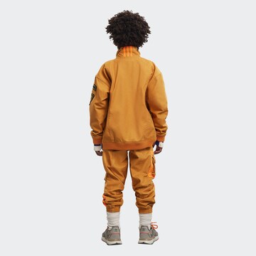 ADIDAS ORIGINALS Tapered Broek 'Ivy Park' in Oranje