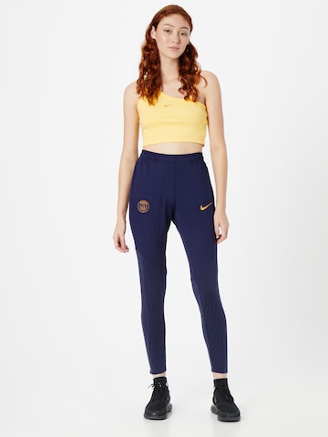 NIKE Slimfit Sportbroek in Blauw