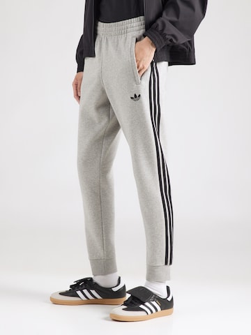 ADIDAS ORIGINALS Tapered Trousers in Grey: front