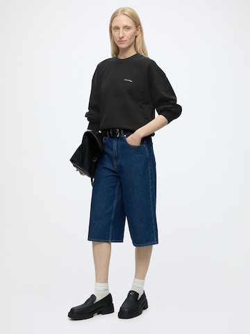 Calvin KleinSweater majica - crna boja