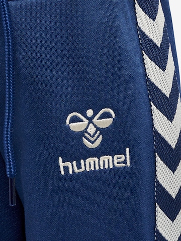 Effilé Pantalon de sport 'Olek' Hummel en bleu