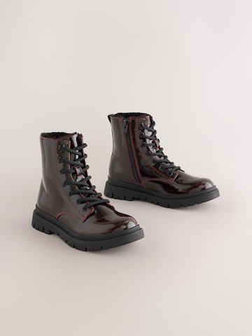 Bottes Next en rouge