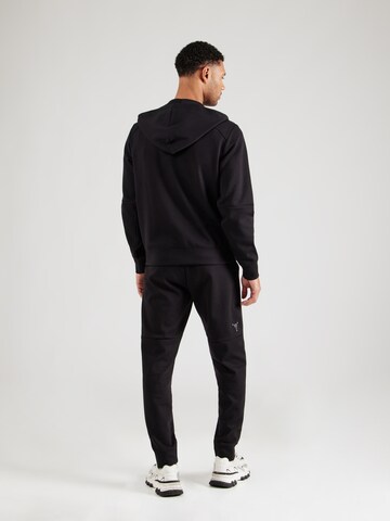 Costum de trening de la Champion Authentic Athletic Apparel pe negru