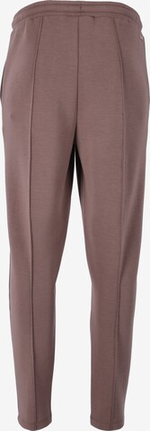 Athlecia Skinny Sportbroek 'Jacey' in Bruin