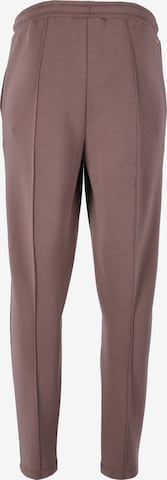 Athlecia Skinny Workout Pants 'Jacey' in Brown