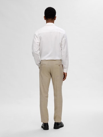 Coupe slim Pantalon à plis 'SLHOasis' SELECTED en beige