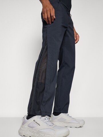 COLUMBIA Regular Urheiluhousut 'Wanoga' värissä musta