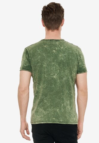Rusty Neal T-Shirt mit zeitlosem Print in Grün