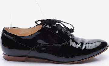Tod's Flats & Loafers in 38 in Black: front