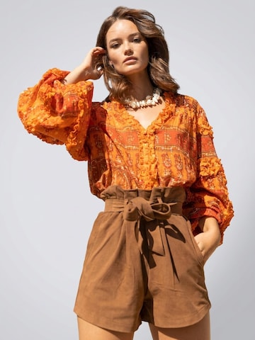 Chemisier 'Blouse Glossy' Miss June en orange