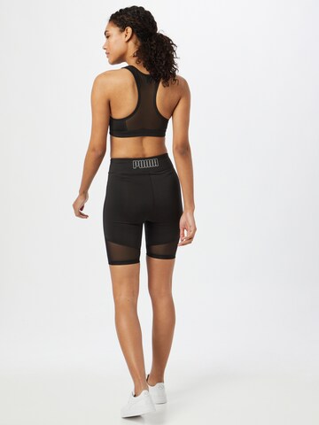 PUMA Skinny Sportbroek in Zwart