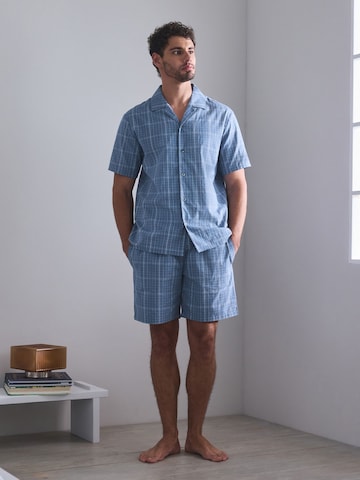 Next Pyjamas kort i blå: forside