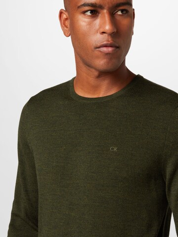 Calvin Klein كنزة صوفية بلون أخضر