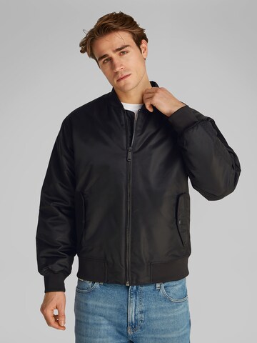 Calvin Klein Jeans Between-season jacket 'HERO' in Black: front
