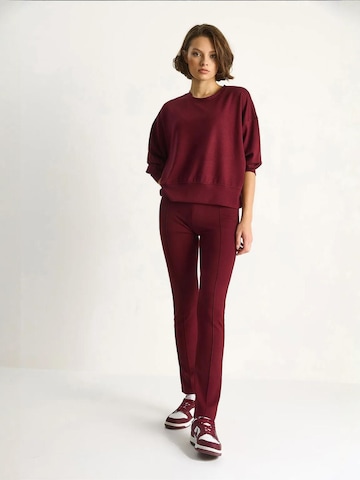 Tuta da jogging di Bianco Lucci in rosso