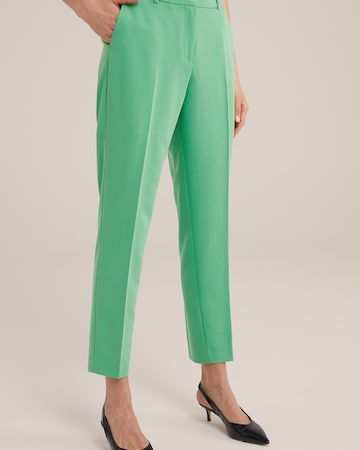 WE Fashion - Slimfit Calças com vincos em verde: frente