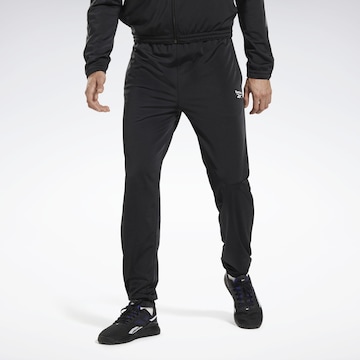Tapered Pantaloni sportivi di Reebok in nero: frontale