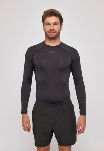 Maglia funzionale di SNOCKS in nero: frontale