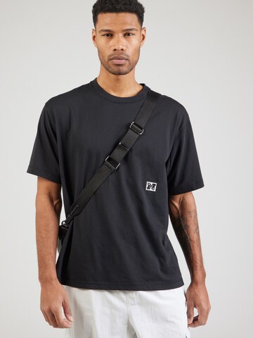 T-Shirt fonctionnel 'HERITAGE' NIKE en noir : devant