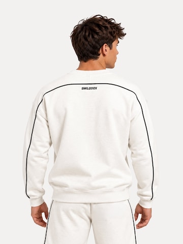 Sweat-shirt 'Brenvaro' Smilodox en beige