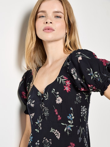Robe ' ' Apricot en noir