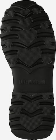 Bottines à lacets Love Moschino en noir