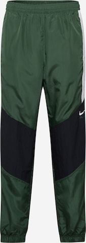 Nike SportswearTapered Hlače 'Air' - zelena boja: prednji dio