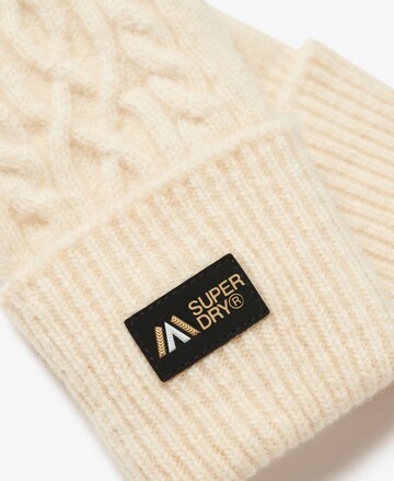 Mitaines Superdry en beige