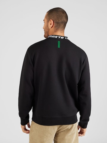 LACOSTE Sweatshirt i svart
