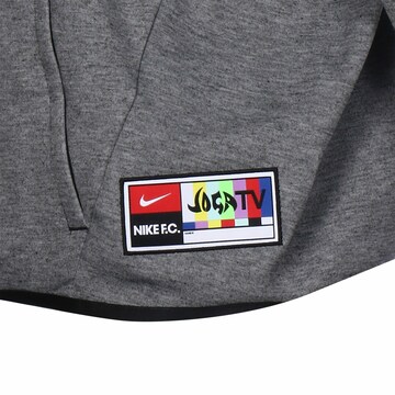 NIKE Jacke in Grau