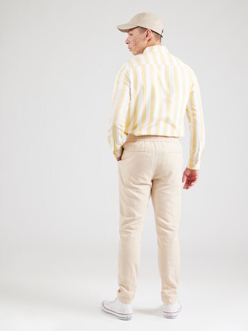 SCOTCH & SODA Дънки Tapered Leg Панталон 'Warren' в бежово