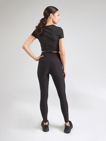PUMA Skinny Fit Спортен панталон 'CLOUDSPUN' в черно