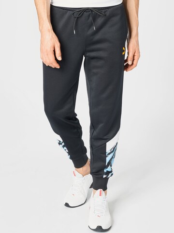 PUMA Tapered Workout Pants in Black: front