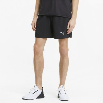 PUMA Regular Workout Pants in Black: front