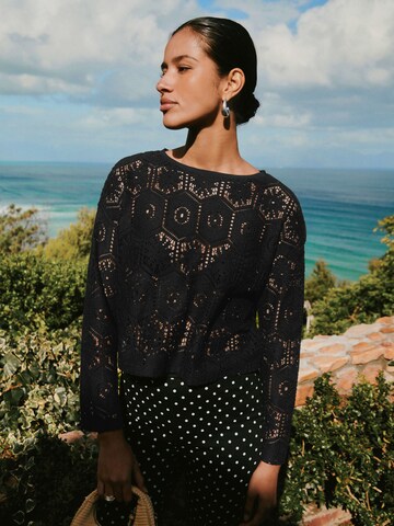 Next Sweater in Black: front