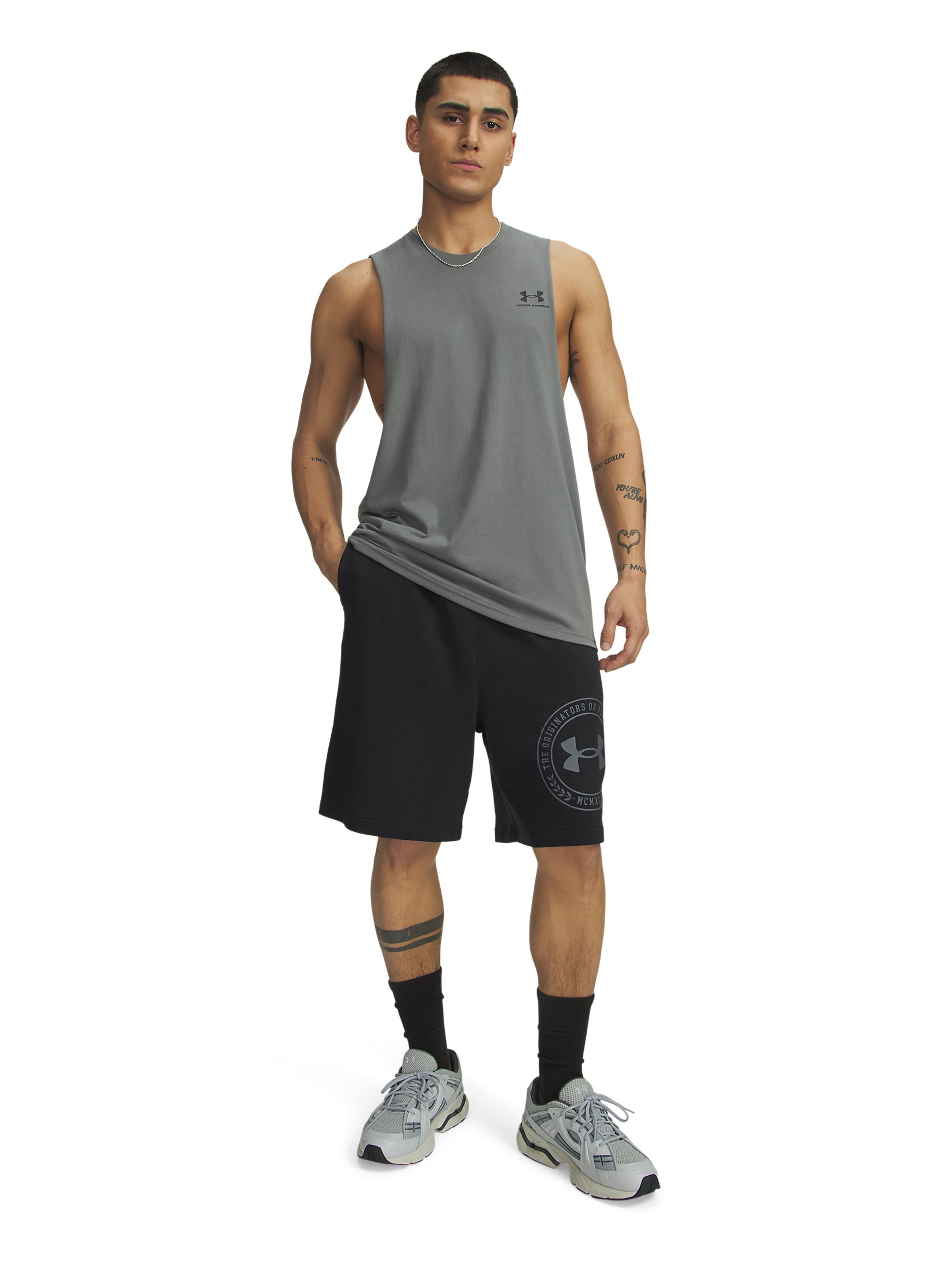 UNDER ARMOUR Wide leg Sportbroek 'Rival' in Zwart