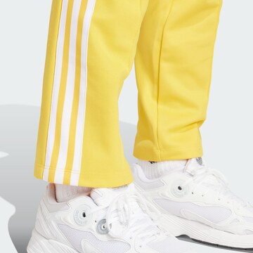 ADIDAS ORIGINALS Regular Broek 'Montreal' in Geel