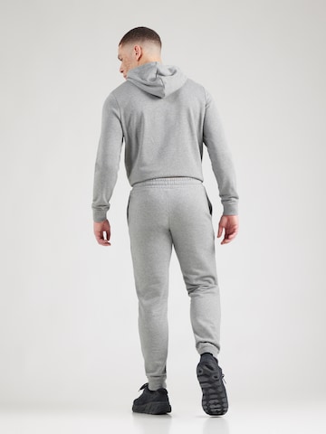 PUMA Конический (Tapered) Спортивные штаны 'ESS No. 1' в Серый