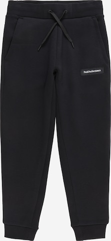 PEAK PERFORMANCE Tapered Pants in Black: front