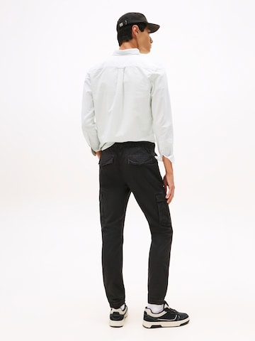 Tapered Pantaloni cargo 'Scanton' di Tommy Jeans in nero