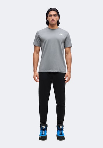 THE NORTH FACE Tapered Παντελόνι φόρμας σε μαύρο