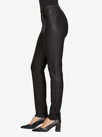 heine - Skinny Leggings em preto