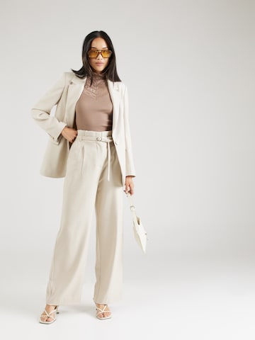 Haut rosemunde en beige