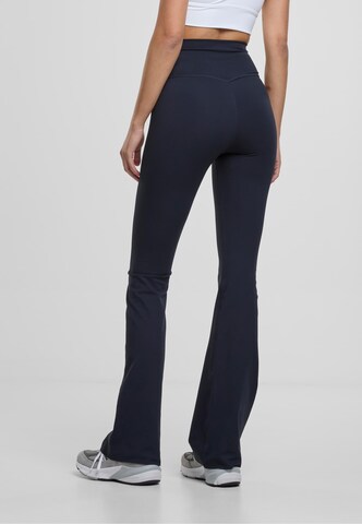 Flared Pantaloni sportivi di Aim'n in blu