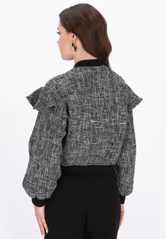 Veste mi-saison 'Festive' faina en noir